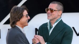 トム・クルーズ、ブラッド・ピット主演映画『F1®／エフワン』のプレミアにサプライズ登場 | Vogue Japan