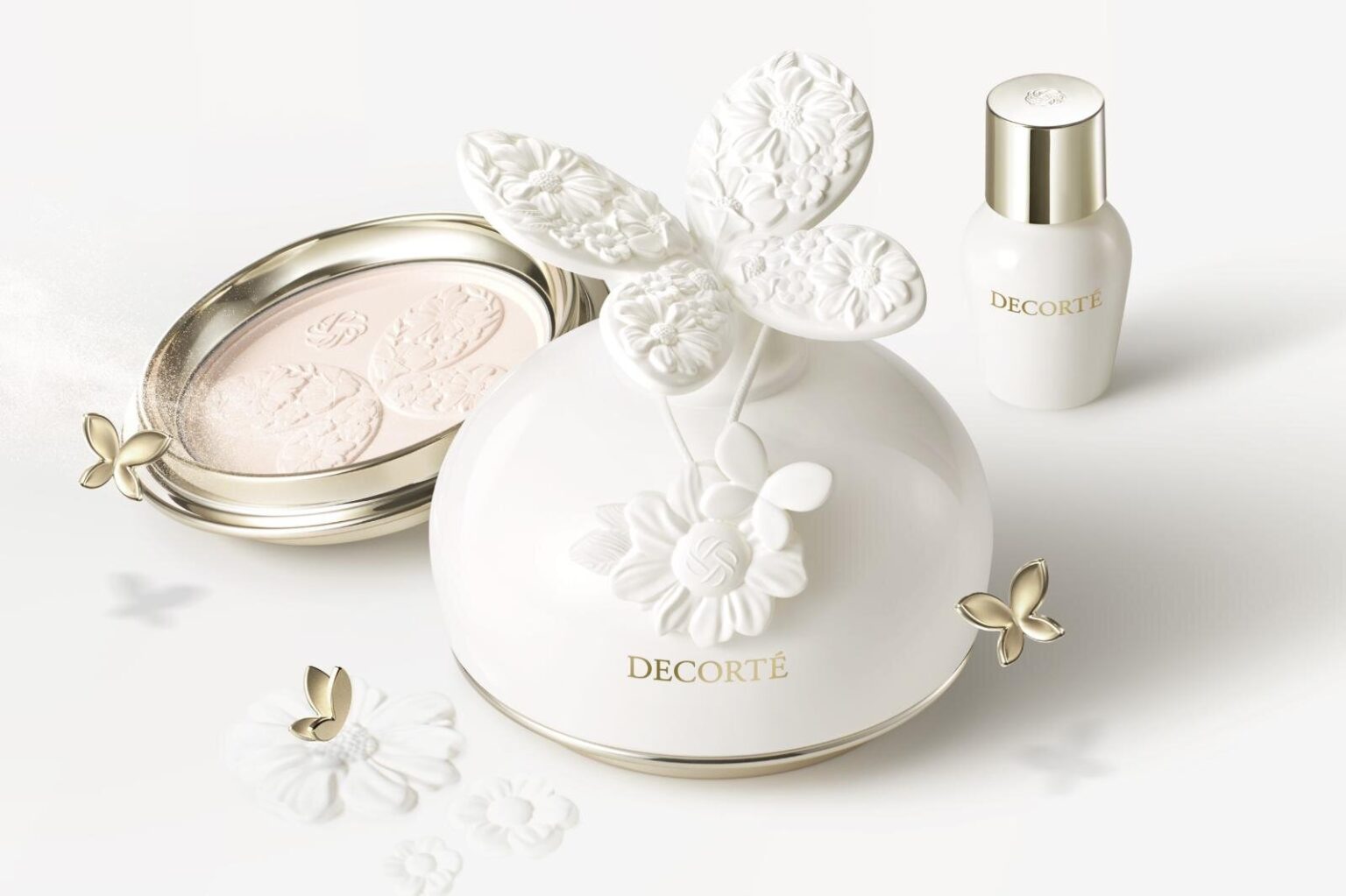 コスメデコルテ究極のフェイスパウダー、蝶＆花々の“アロマストーン風”純白ドーム型ケースで - ファッションプレス
