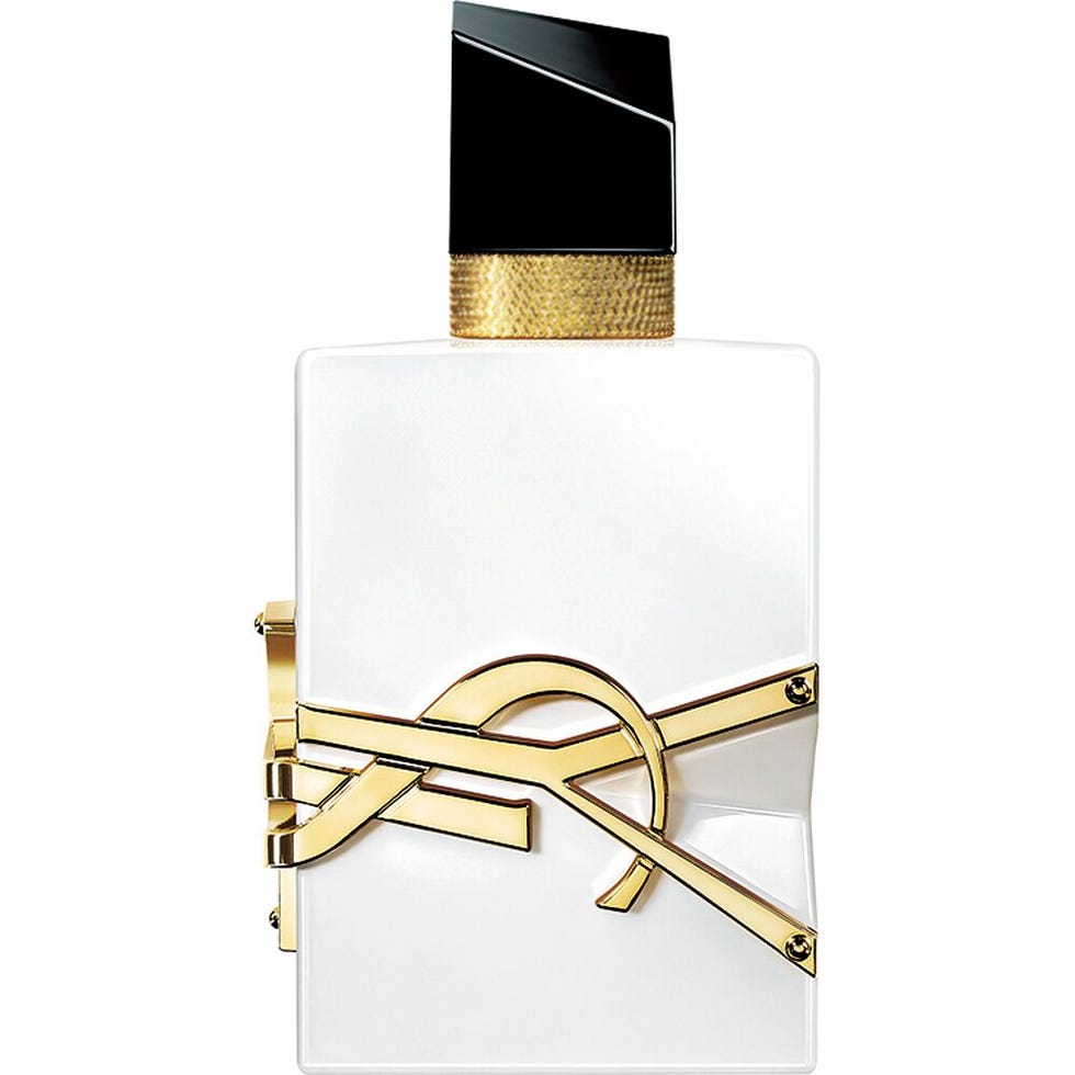 fragrance bottle featuring a modern design with a black and gold cap